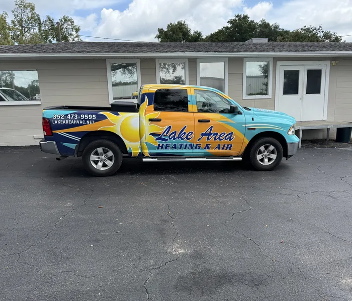 Lake Area Heating & Air wrapped service pickup outside the Keystone Heights office
