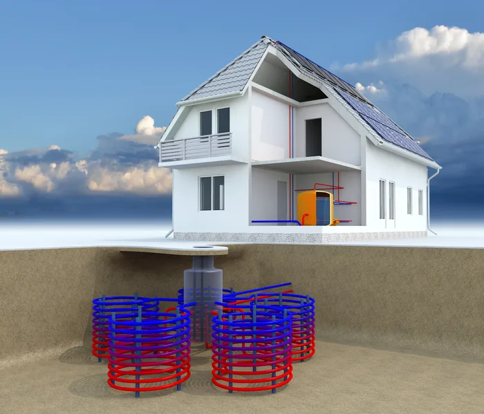 Illustration of spiral geothermal ground loops beneath a home
