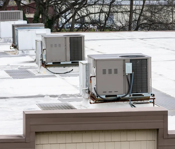 Row of condenser units on a rooftop